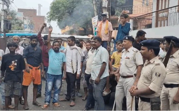 people protest in danapur